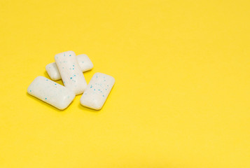  chewing gum on a yellow background