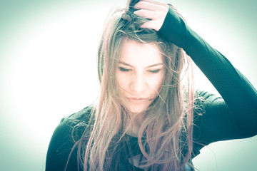 moody portrait of a beautiful young female model
