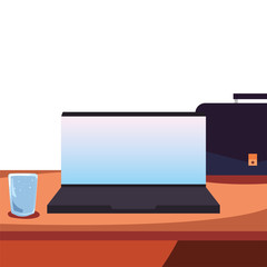 office workspace laptop suitcase glass cup