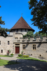 Fototapeta na wymiar Historic courtyard of ancient castle with watchtower in Little Carpathians, Slovakia