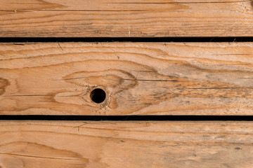 Texture of wooden boards with hole
