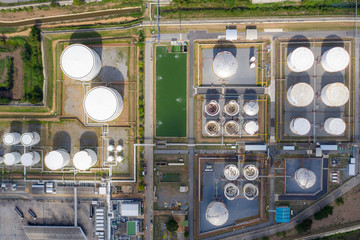 Aerial view oil terminal is industrial facility for storage of oil and petrochemical products ready...