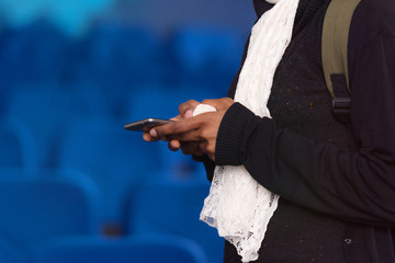 African american muslim  business womanusing phone after presentation for business people, multiracial and multiethnic business peoople at conference meeting room.