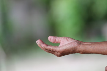 Old man hands with wrinkled skin