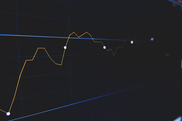 Stock market trading graph and candlestick chart on screen for businese financial investment concept. Economy trends background. Abstract finance and invest background.