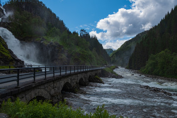 Obraz na płótnie Canvas Latefossen (Latefoss) twin waterfall - one of the biggest waterfalls in Norway, nearby Odda. HDR image, july 2019