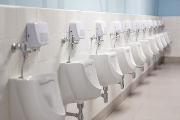Selective focus of Urinals in bathroom