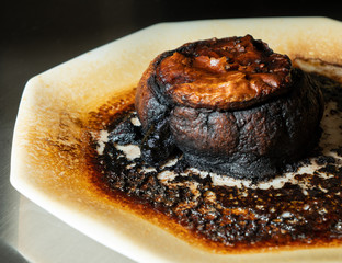 Pastry meat pie completely charred and burned after leaving in the microwave oven too long