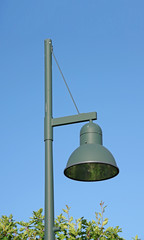 Public street lamp shaped like a bell