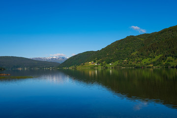 Naklejka na ściany i meble View of Oppheimsvatnet lake, Voss, Norway. July 2019