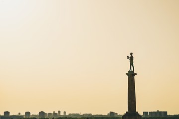 Fototapeta na wymiar Shots in Beograd: Sunset with Statue