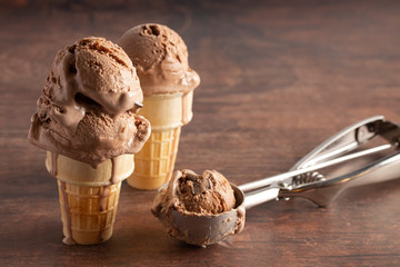 Chocolate Ice Cream Cone on a Wooden Table