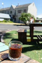 glass of coffee on table in cafe