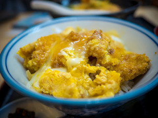Japanese food(Katsudon), fried pork with egg on rice.