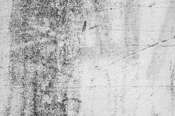 Texture of a concrete wall with cracks and scratches which can be used as a background