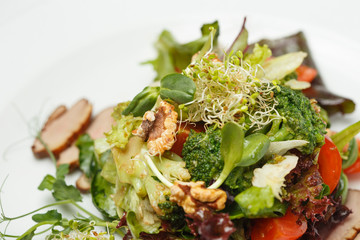 vegetable salad with nuts and meat