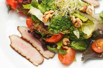 vegetable salad with nuts and meat