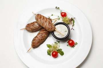 Lula kebab grill with sour cream garlic sauce
