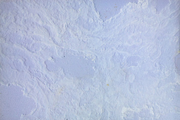 White stain texture  on black plastic background