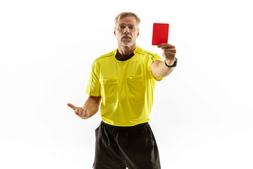 Referee showing a red card to a displeased football or soccer player while gaming isolated on white...