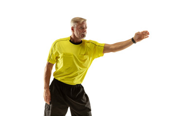 Referee gives directions with gestures to football or soccer players while gaming isolated on white...