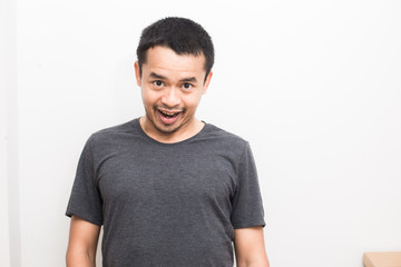 Attractive smiling asian handsome men wear casual shirt