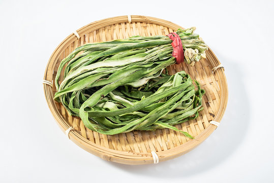 a green tribute dish on a white background