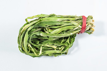 a green tribute dish on a white background