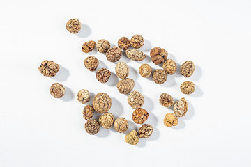 Chinese food commonly used spicy cooking seasoning spices, dried cardamom on white background