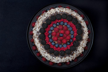 vegan cake with raspberries,blueberries, blackberries