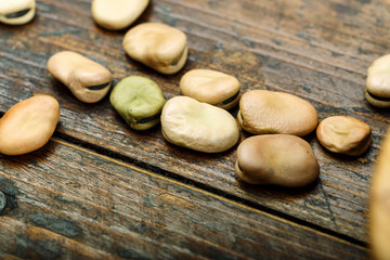 dry beans on a wooden background