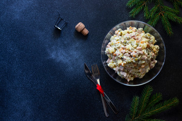 Traditional Russian New Year and Christmas salad of vegetables, meat and mayonnaise called Olivier....