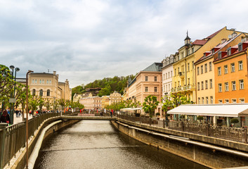 River and stone pedestrian bridge, Karlovy Vary