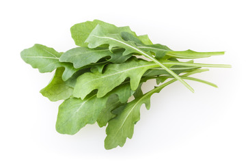 Heap of fresh arugula leaves isolated on white background