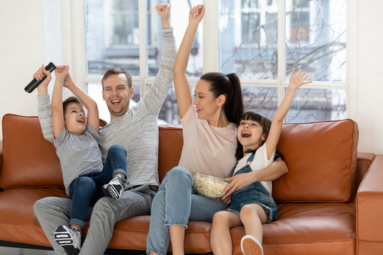 Overjoyed Excited Family Football Fans Watching Sport Tv Celebrating Goal