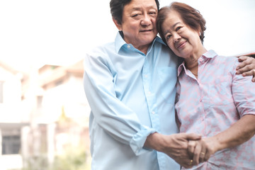 Happy elderly couple with lifestyle after retiree concept. Lovely asian seniors couple embracing together .