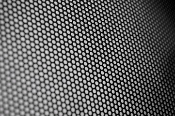 abstract metal background with holes