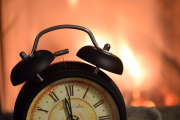 old alarm clock on a black background