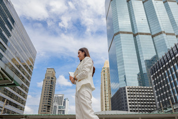 Fototapeta premium business working woman walks through the office building