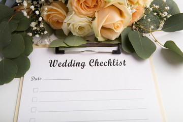 Wedding checklist with empty space for text and roses