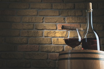Cognac,brandy, cigar, glass and bottle.Oak barrel.Luxury lifestyle.Wine cellar.Quality alcohol concept.Retro & Vintage style.