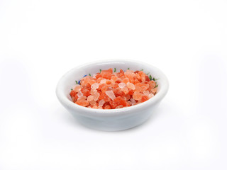 Himalaya pink salt in bowl isolated on white background.   