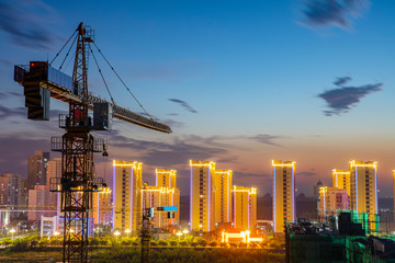 Tower cranes at night