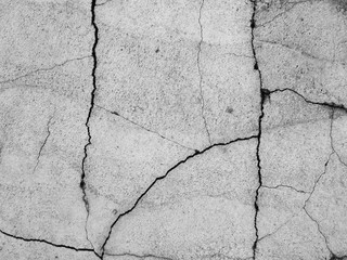 Cracked concrete texture closeup background