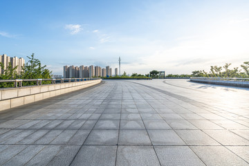 city skyline with empty square