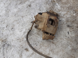 Old car parts. Caliper for braking, stopping the car.