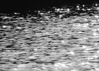 water wave in the canal with plastic bottle and sunny in the morning