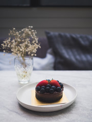 Chocolate ganache cake with mixed berries