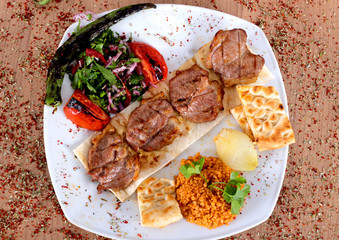 Turkish toppings with fresh peppercorns and fresh vegetables from a high angle