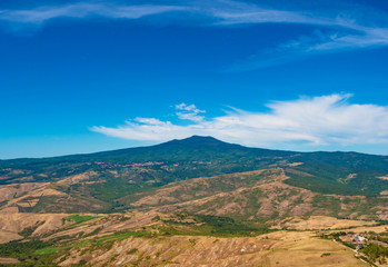 Radicofani (Italy) - The view from the medieval and renaissance town on Val d'Orcia, famous for ruins of an old castle; Tuscany region, province of Siena